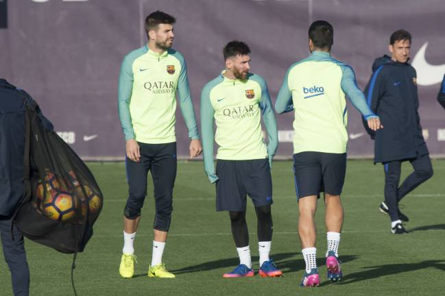 Messi and Pique training with Barcelona