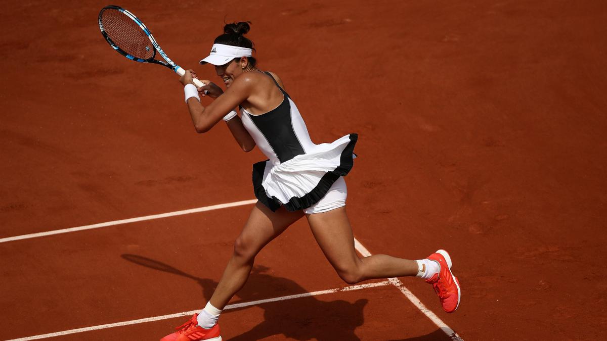 Muguruza begins French Open defence with win over Schiavone