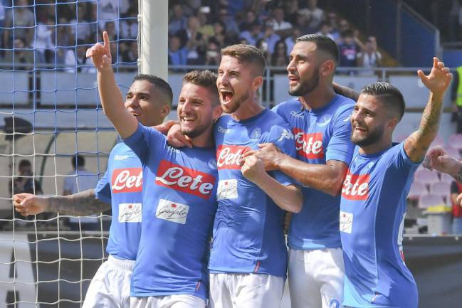 Napoli's forward Dries Mertens celebrates with his teammates after scoring the second goal.