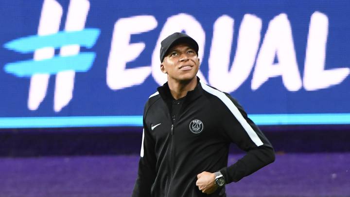 Paris Saint-Germain (PSG) player Kylian Mbappe walks on the pitch, at the Constant Vanden Stock Stadium in Brussels