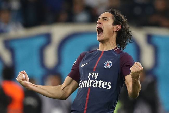 How different things could be | Paris Saint-Germain's Uruguayan forward Edinson Cavani celebrates after scoring.