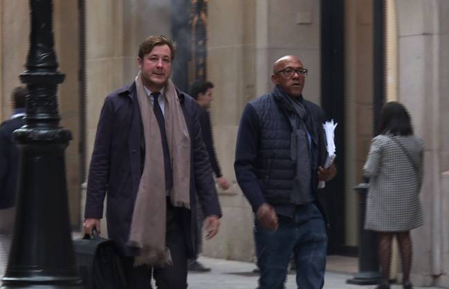 An image grab from an AFP TV video shows International Olympics Committee member Frankie Fredericks arriving at the financial crimes court building (pole financier du tribunal de grande instance) of Paris on November 2, 2017 as part of a probe into graft allegations over the awarding of the 2016 Olympics to Rio.