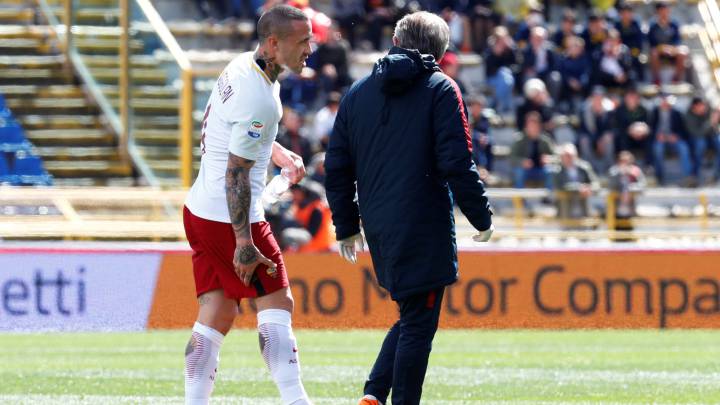 Roma's Radja Nainggolan walks off the pitch after sustaining an injury