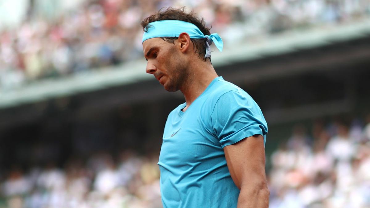Nadal's set streak ended by Schwartzman as rain halts clash