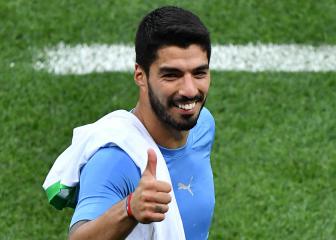Suárez announces wife's pregnancy after sending Uruguay into last 16