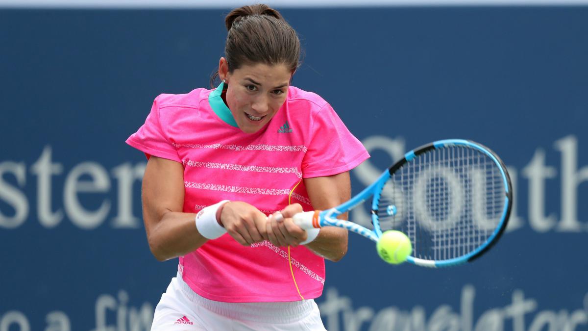 Rain halts Halep as Muguruza's defence ends and Wozniacki retires