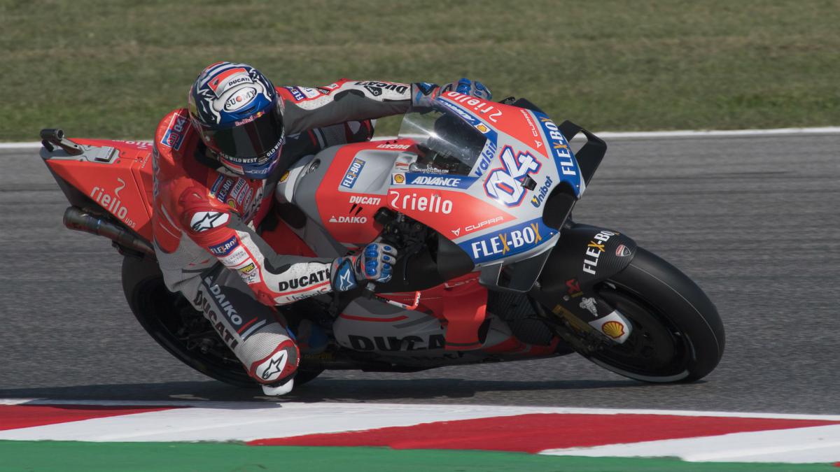 Dovizioso triumphs as Lorenzo crash hands Marquez second