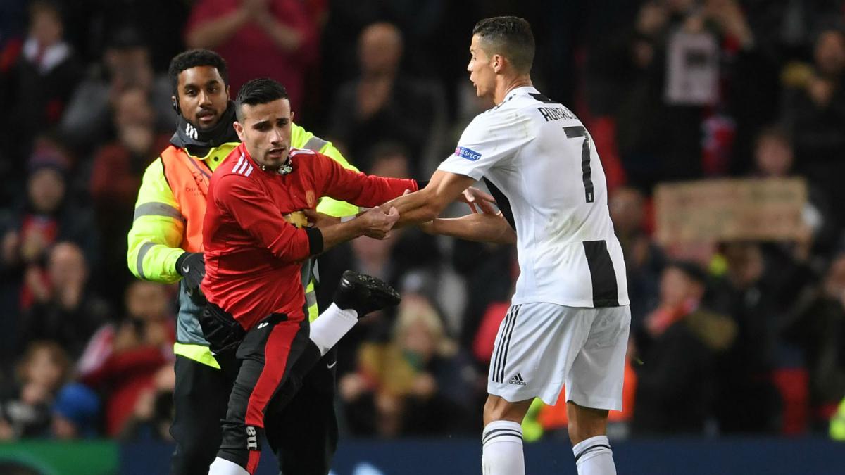 Manchester United hit with UEFA charge over pitch invasions