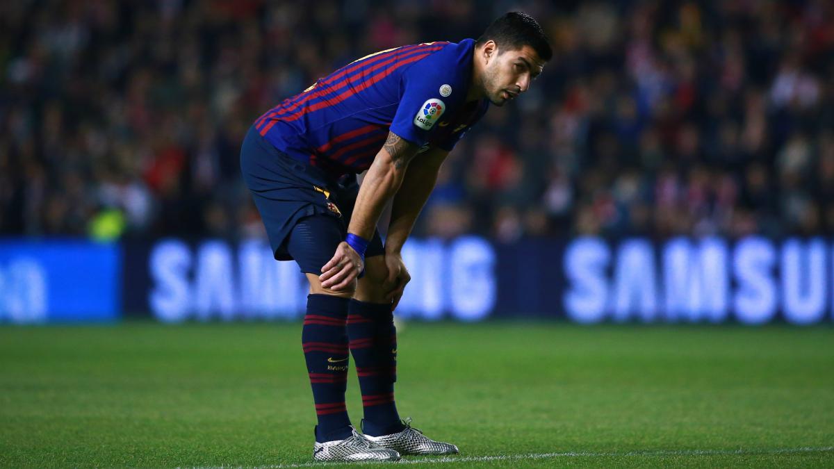 Suarez out for two weeks as Barcelona suffer treble injury blow