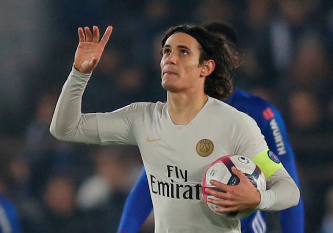 Where next? Paris St Germain's Edinson Cavani celebrates scoring their first goal against Strasbourg.