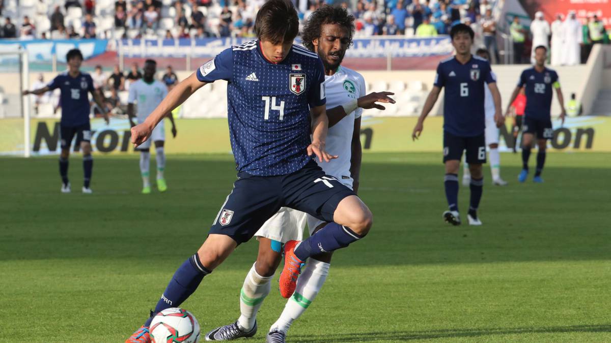 Japan see off Saudi to reach quarters