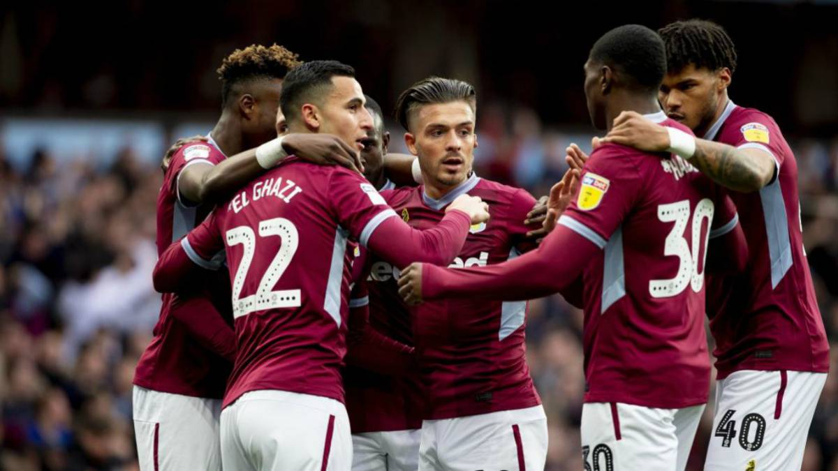 Aston Villa players celebrating after a Championship victory