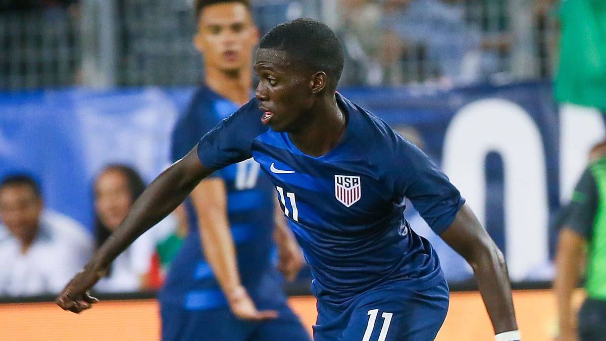 Tim Weah in action with the US men's national team