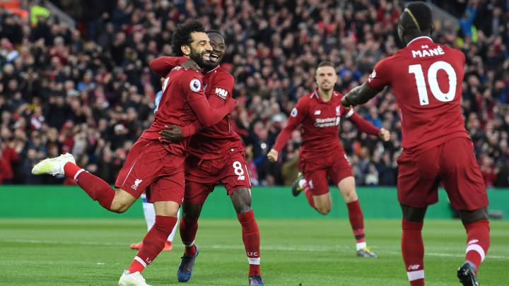 Liverpool go top as Mané and Salah grab braces apiece