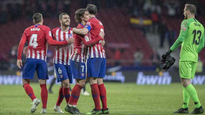 Arias, Griezmann, Koke, Godin, Oblak celebrating after the game against Valencia