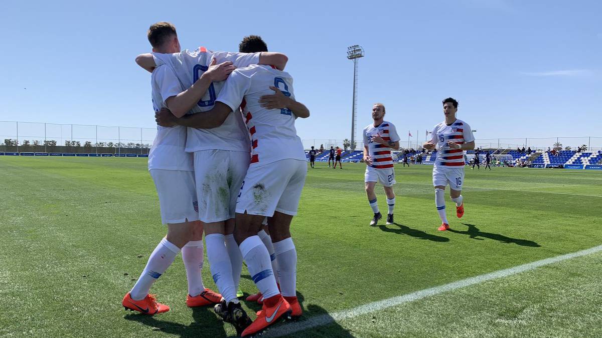 USMNT U20 celebrating after defeating Japan 2-1