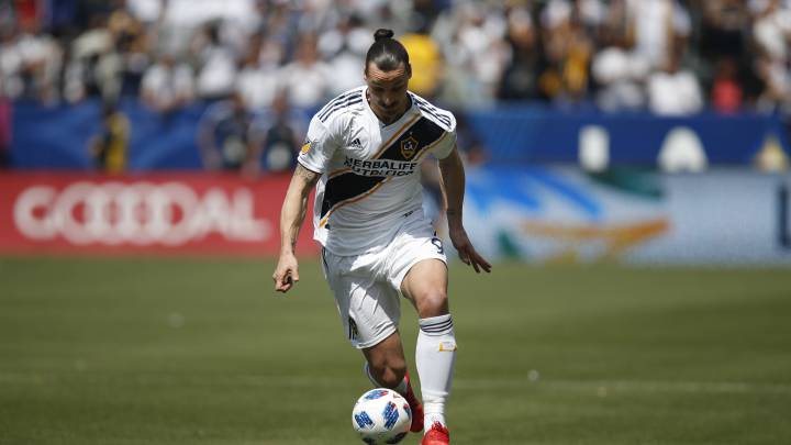 Los Angeles Galaxy's Zlatan Ibrahimovic, of Sweden, dribbles the ball