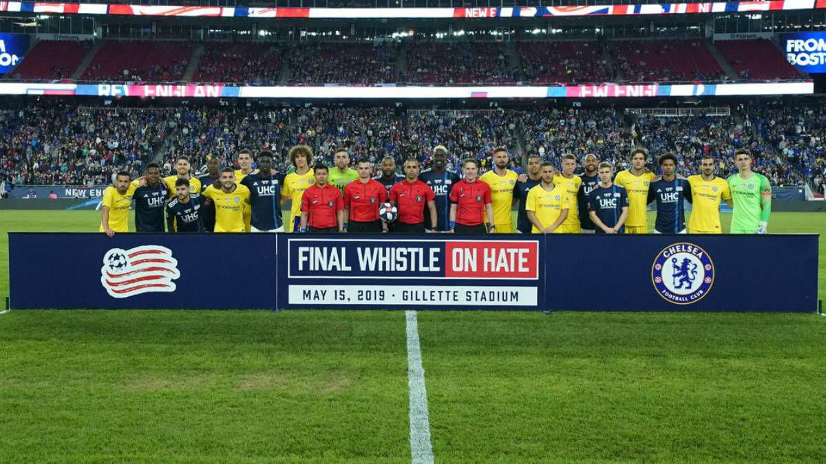 The Final Whistle on Hate team's picture with New England Revolution and Chelsea players combined