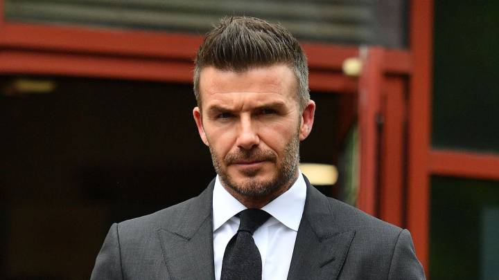 Former England international footballer David Beckham leaves Bromley Magistrates Court in Bromley,after being disqualifeid from driving for six months for driving while using a mobile phone