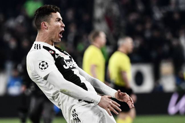 Madrid's missing element | Juventus' Portuguese forward Cristiano Ronaldo celebrates after scoring against Atlético Madrid.