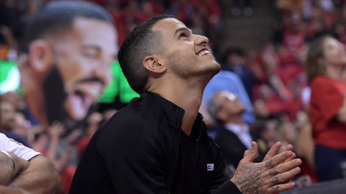Former Toronto FC forward and MLS MVP Sebastian Giovinco looks on from courtside seats as Toronto Raptors defeat Milwaukee Bucks in game six of the Eastern Conference final at Scotiabank Arena