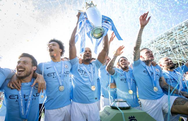 An integral part | Manchester City's David Silva with more silverware.