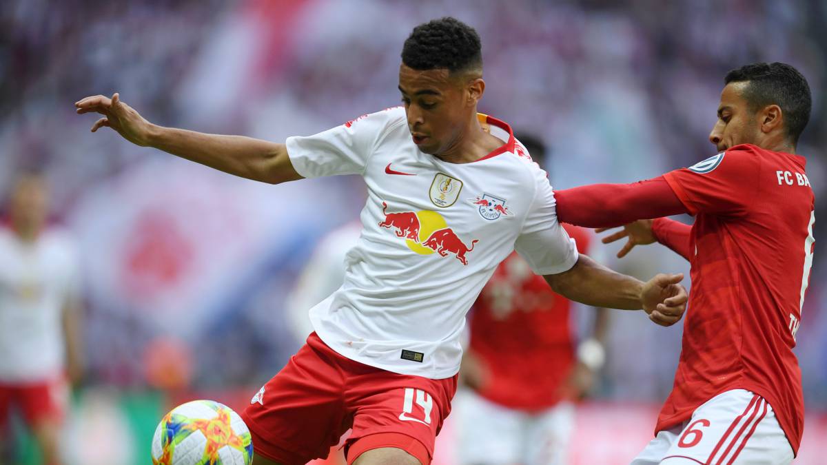 Thiago Alcantara of Bayern Munich battles for possession with Tyler Adams of RB Leipzig during the DFB Cup final between RB Leipzig and Bayern Muenchen