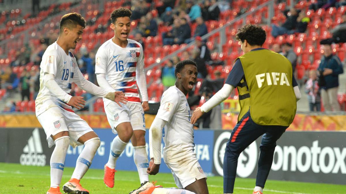 Tim Weah of the United States celebrates with team mates after scoring their team's first goal during the 2019 FIFA U-20 World Cup group D match between USA and Qatar