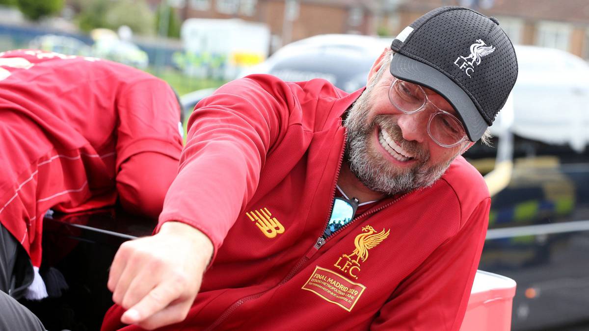 Liverpool's Jurgen Klopp on board a parade bus after winning the UEFA Champions League final against Tottenham Hotspur in Madrid on June 2, 2019 in Liverpool, England.