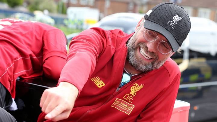 Liverpool's Jurgen Klopp on board a parade bus after winning the UEFA Champions League final against Tottenham Hotspur in Madrid on June 2, 2019 in Liverpool, England.