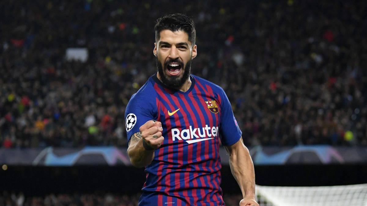 Luis Suárez celebrating after scoring with Barcelona against Real Madrid