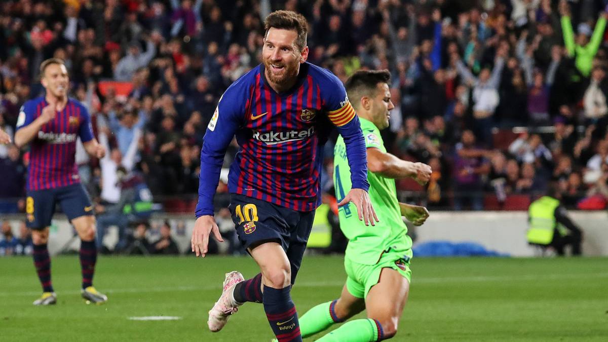 Lionel Messi celebrating after scoring with FC Barcelona