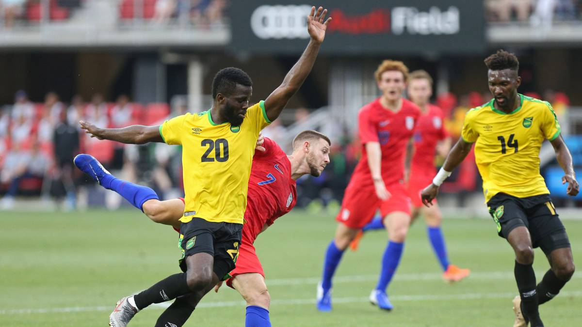 United States defender Paul Arriola and Jamaica defender Kemar Lawrence battle for the ball in the first half during an international friendly soccer match at Audi Field