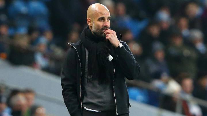 Pep Guardiola at the sidelines during a Manchester City game