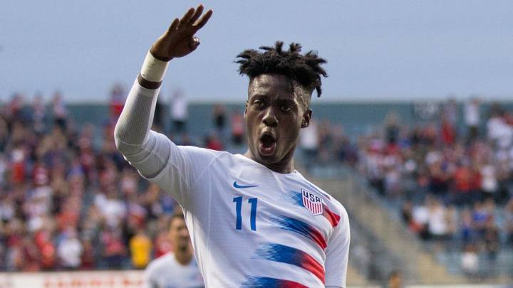 Tim Weah celebrating after scoring with U20 US national team