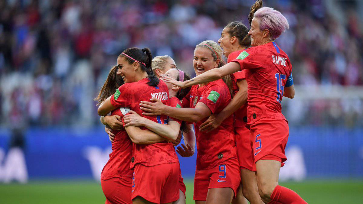 USWNT celebrates during the World Cup opening match against Thailand