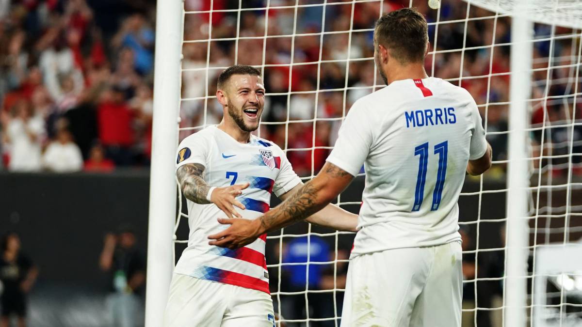 Paul Arriola and Jordan Morris of the US celebrate after scoring against Trinidad and Tobago during their CONCACAF Gold Cup group stage football match