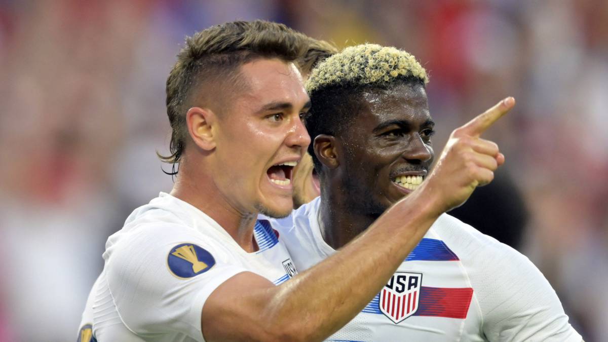 United States defender Aaron Long celebrates his goal with forward Gyasi Zardes against Trinidad and Tobago