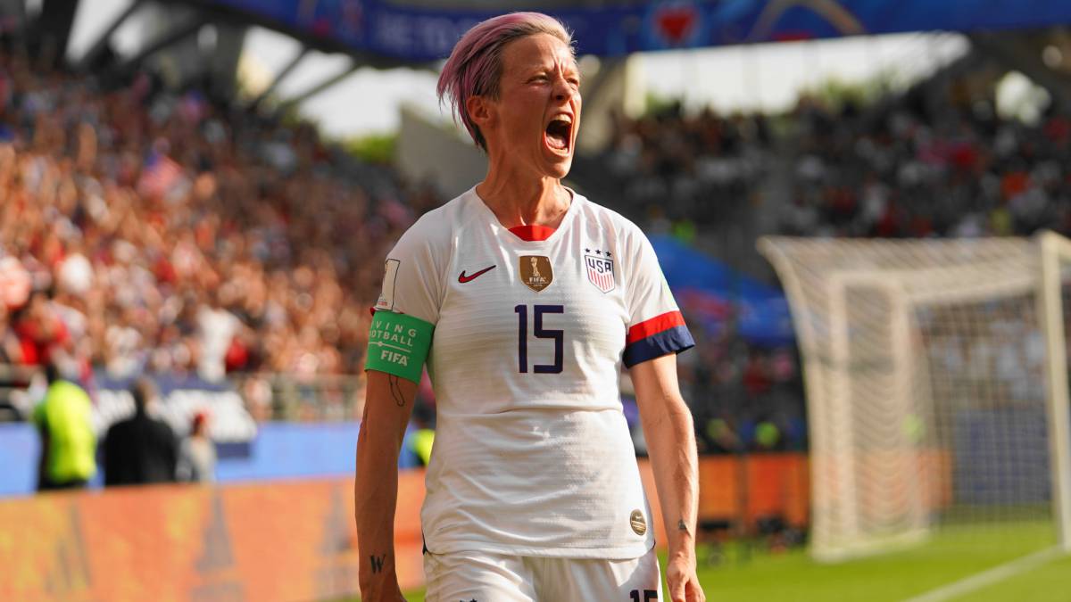 Megan Rapinoe of the USA celebrates scoring a goal from the penalty spot after a VAR during the 2019 FIFA Women's World Cup France Round Of 16 match between Spain and USA
