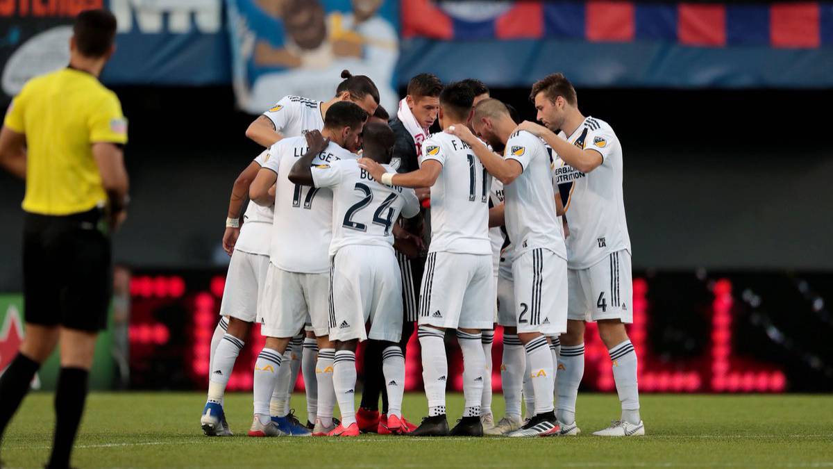 LA Galaxy players celebrating after winning week 16 MLS match