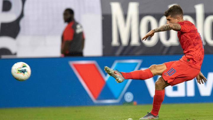 Christian Pulisic shoots the ball during their CONCACAF Gold Cup semi-final football match against Jamaica at Nissan Stadium in Nashville