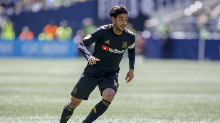 Los Angeles FC forward Carlos Vela dribbles the ball against the Seattle Sounders FC during the second half at CenturyLink Field.