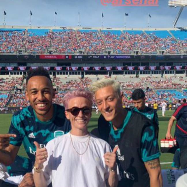 Megan Rapinoe with Mesut Ozil and Pierre-Emerick Aubameyang