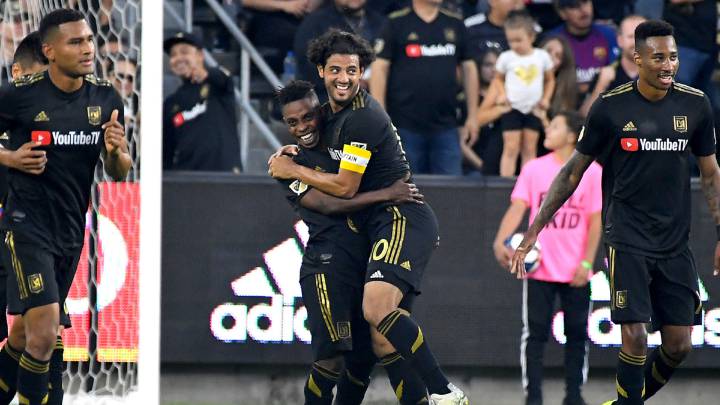 Carlos Vela celebrates after a goal by Los Angeles FC forward Latif Blessing in the first half of the game at Banc of California Stadium