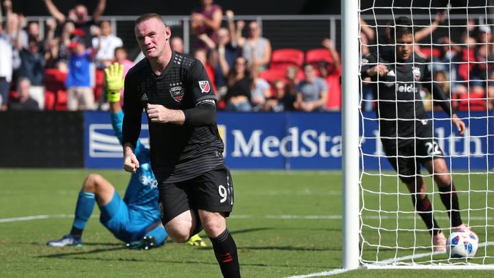 Wayne Rooney celebrates after scoring a goal against Chicago Fire in the second half at Audi Field. United won 2-1.