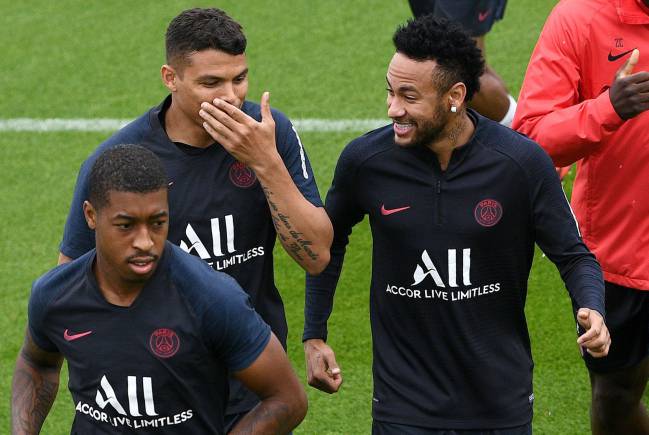 'Have you heard who they're offering in part exchange?' PSG's Silva jokes with Neymar at training.
