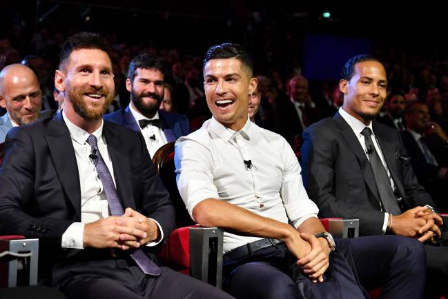 Cristiano Ronaldo sat with Lionel Messi at the UEFA Champions League Draw.