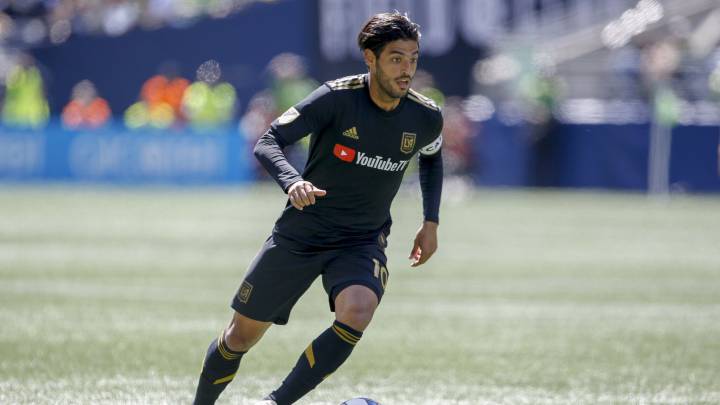 Carlos Vela dribbles the ball against the Seattle Sounders FC during the second half at CenturyLink Field