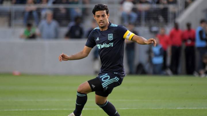 Carlos Vela dribbles the ball against the Seattle Sounders FC during the second half at CenturyLink Field