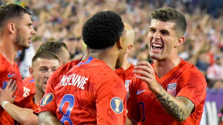 Weston McKennie (8) celebrates with teammates after scoring a goal against Jamaica during the first half of semi-final play in the CONCACAF Gold Cup